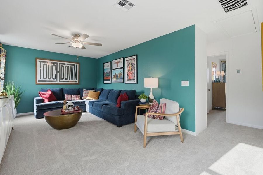 Representative furnished interior of a home built from the Hawk by Taylor Morrison in Longview 40s, Del Valle (Image 13).