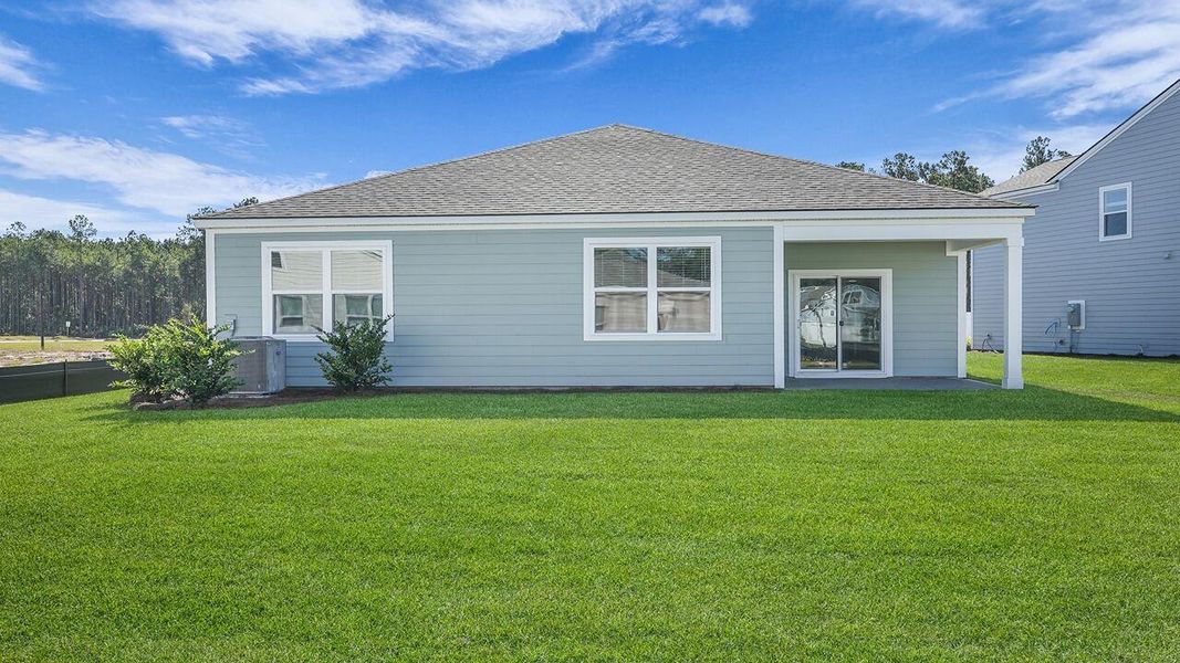 Exterior details and patio area of a home in Hillcrest, Ravenel (Image 16). Exterior details and patio area of a home in Hillcrest, Ravenel (Image 16).