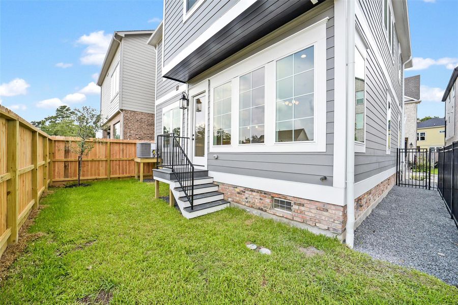 Exterior details and patio area of a home in Reserve in Memorial, Houston (Image 4). Exterior details and patio area of a home in Reserve in Memorial, Houston (Image 4).