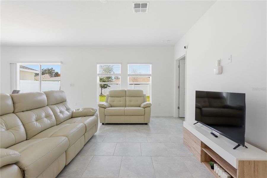 Furnished interior view inside a new home in Vineland Reserve, Osteen (Image 11).