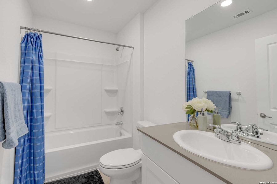 Furnished interior view inside a new home in Mission del Lago, San Antonio (Image 15).