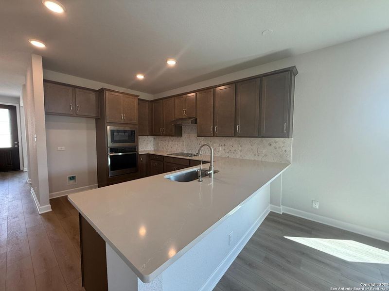 Furnished interior view inside a new home in The Summit at Saddlebrook Ranch 55's, Schertz (Image 6).
