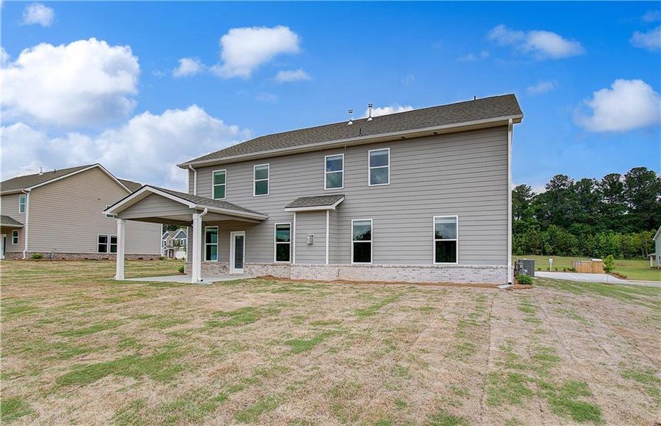 Exterior details and patio area of a home in Copperfield, Locust Grove (Image 4).