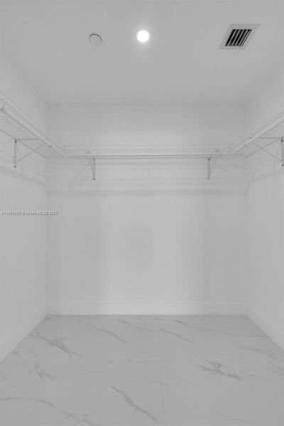 Spacious, unfurnished interior of a new home in Aria Reserve, Miami (Image 22). Spacious, unfurnished interior of a new home in Aria Reserve, Miami (Image 22).