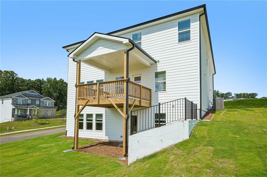 Exterior details and patio area of a home in River Pointe, Monroe (Image 27).