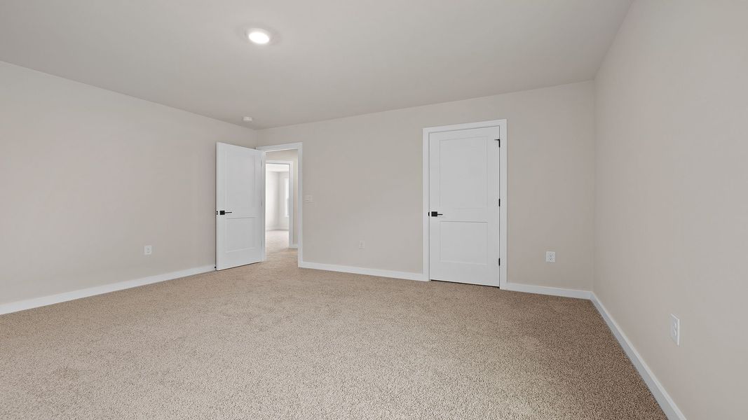 Spacious, unfurnished interior of a new home in Adams Glen, Greenville (Image 30).