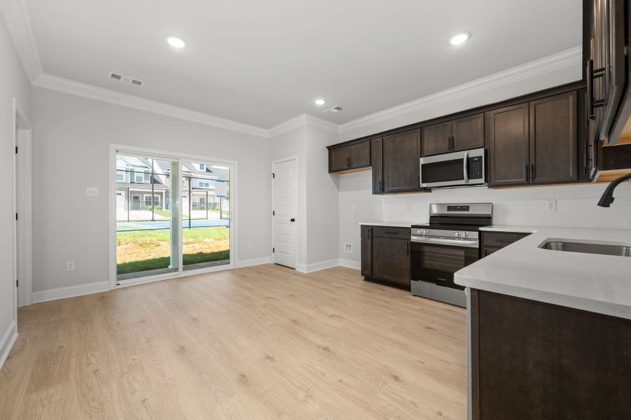 Front exterior of a new home in Saddlebrook, Murfreesboro, TN, highlighting curb appeal (Image 2).