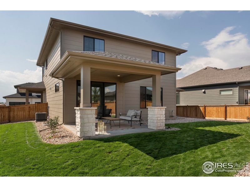 Front exterior of a new home in Greenspire At Windsor Lake, Windsor, CO, highlighting curb appeal (Image 21).