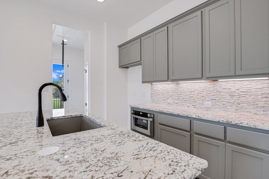 Representative furnished interior of a home built from the Casita by Giddens Homes in Whispering Wind, Bertram (Image 42).