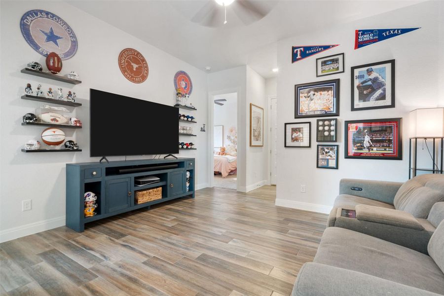 Hardwood-style flooring extends through this relaxed family room. Hardwood-style flooring extends through this relaxed family room.