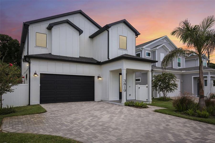 Front exterior of a new home in , St. Petersburg, FL, highlighting curb appeal (Image 28). Front exterior of a new home in , St. Petersburg, FL, highlighting curb appeal (Image 28).