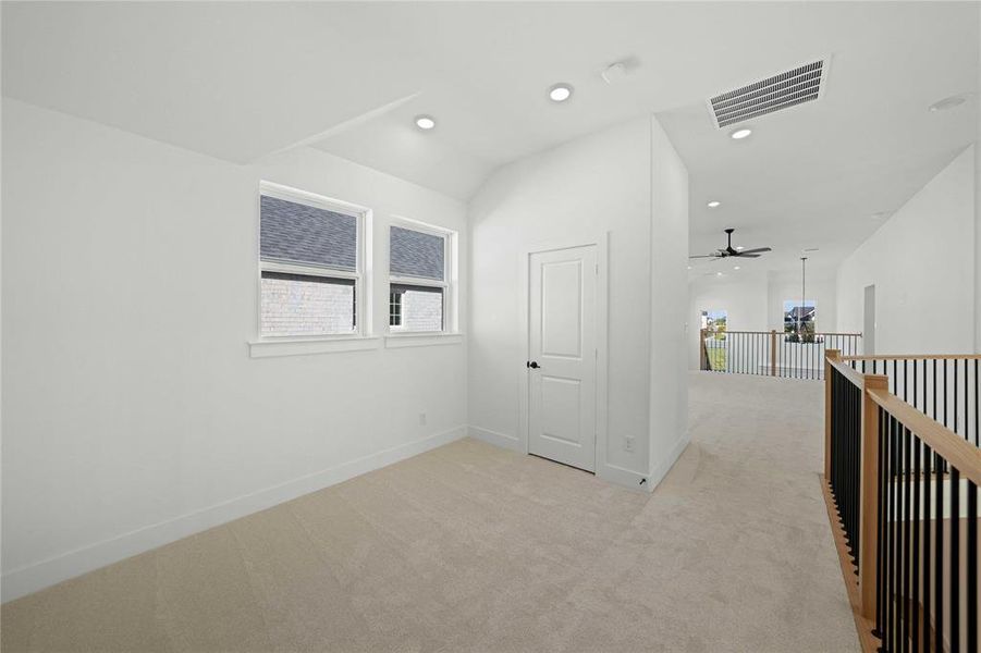 Corridor featuring light carpet and recessed lighting Corridor featuring light carpet and recessed lighting