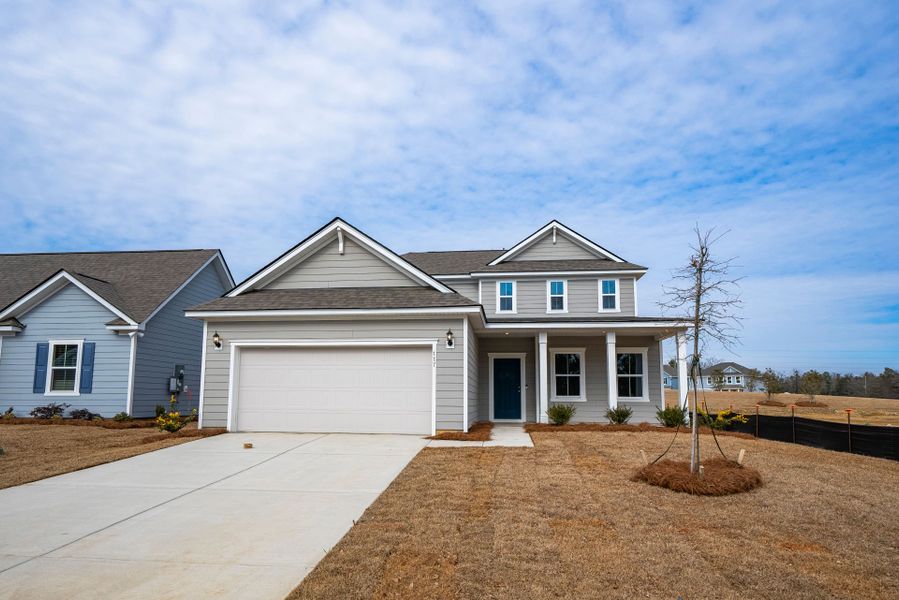 Front exterior of a new home in Monroe Preserve, Chapin, SC, highlighting curb appeal (Image 27).
