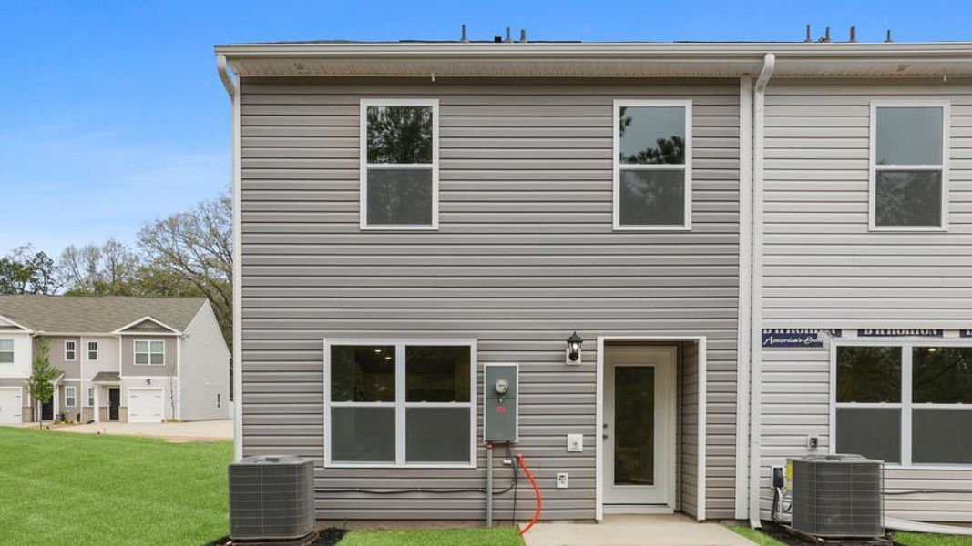 Exterior details and patio area of a home in Covington Village, Greer (Image 3).