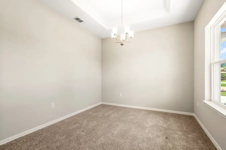 Representative unfurnished interior of a home built from the Delray by Holiday Builders in Palm Bay, Palm Bay (Image 6).