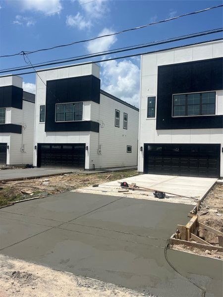 Front exterior of a new home in , Houston, TX, highlighting curb appeal (Image 2).