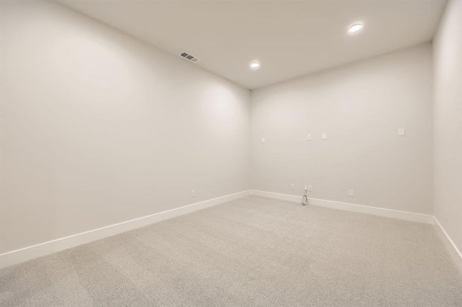 Empty room featuring carpet floors