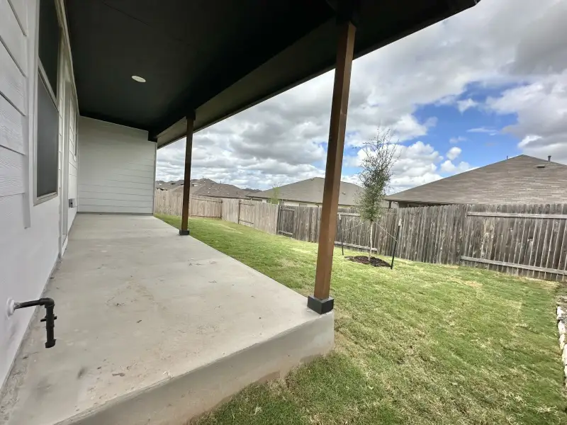 Exterior details and patio area of a home in Crosswinds, Kyle (Image 18). Exterior details and patio area of a home in Crosswinds, Kyle (Image 18).