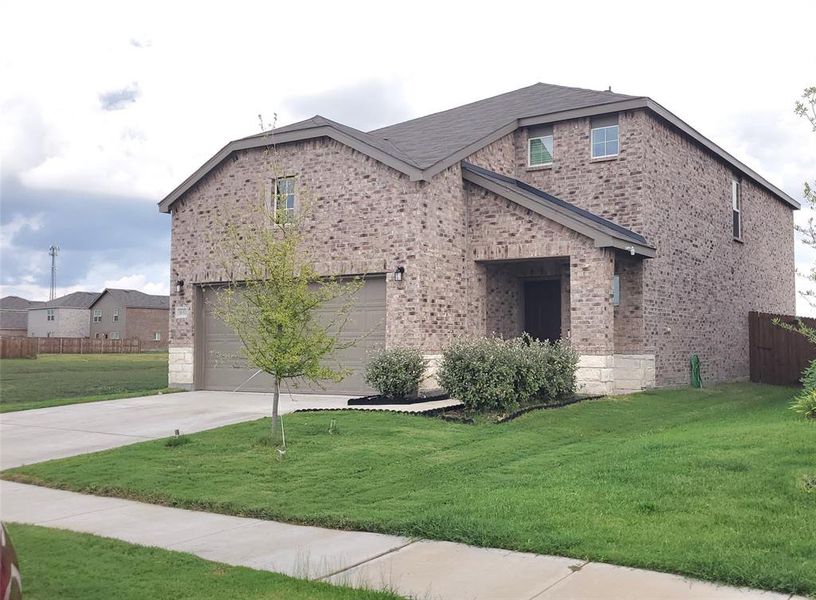 Front exterior of a new home in , Kaufman, TX, highlighting curb appeal (Image 2). Front exterior of a new home in , Kaufman, TX, highlighting curb appeal (Image 2).