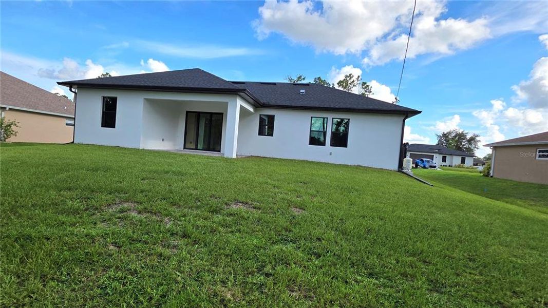 Front exterior of a new home in , North Port, FL, highlighting curb appeal (Image 8).