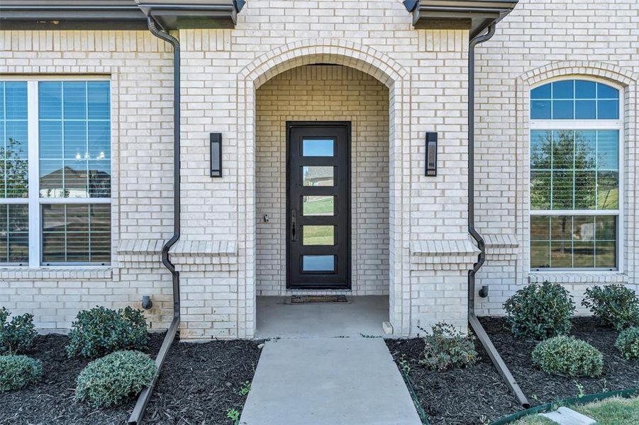 Exterior details and patio area of a home in , Godley (Image 25).