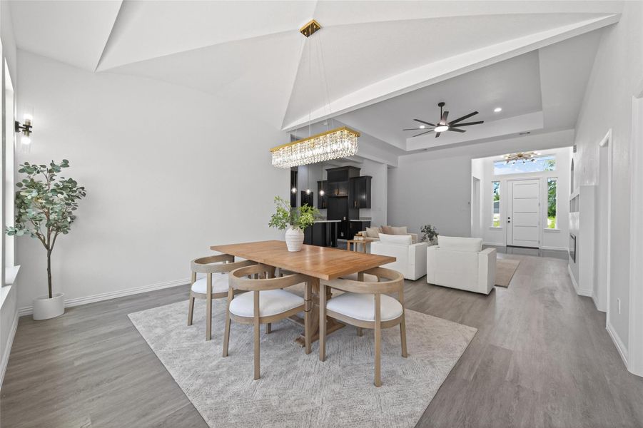Spacious dining area ideal for hosting gatherings while overlooking the open living spaces.
