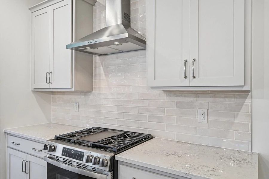 Kitchen featuring the AW Collection® Milan - Chic gray finishes and smooth surfaces shine. Kitchen featuring the AW Collection® Milan - Chic gray finishes and smooth surfaces shine.