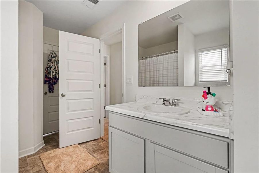 Furnished interior view inside a new home in Preserve at Dove Creek, Statham (Image 8).