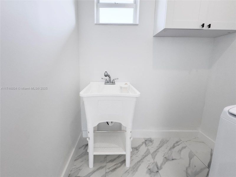 Furnished interior view inside a new home in , Port St. Lucie (Image 14).