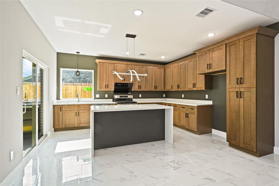 quartz counter top in kitchen and bathrooms