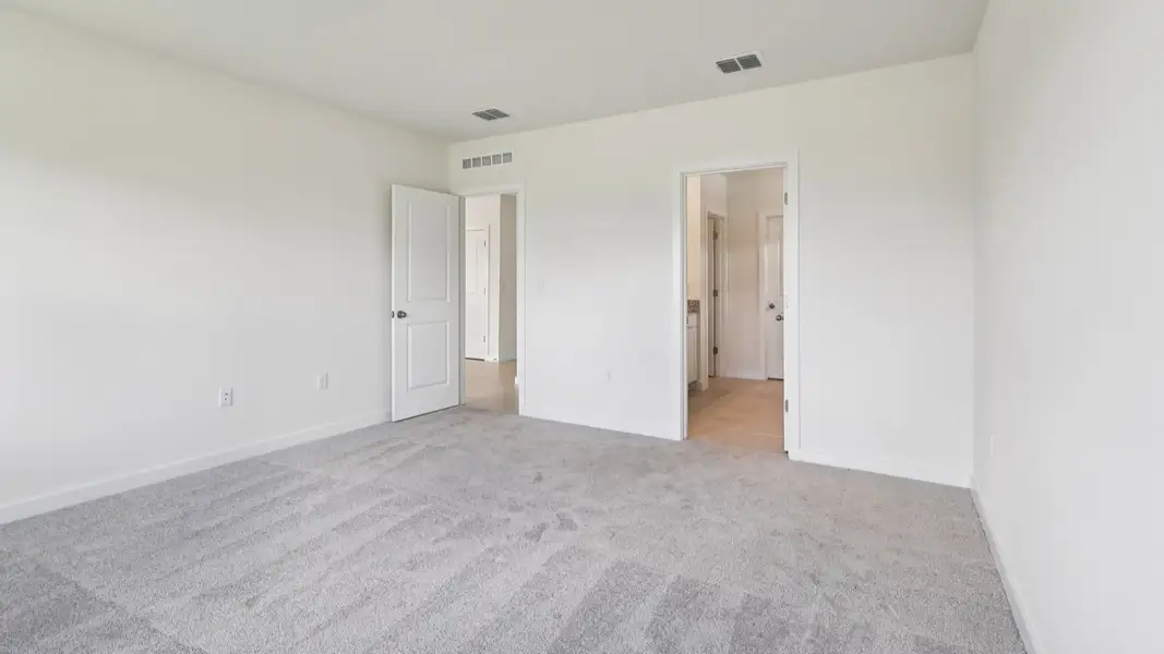 Representative unfurnished interior of a home built from the Baker by DRB Homes in Liberty Trace, Haines City (Image 35).