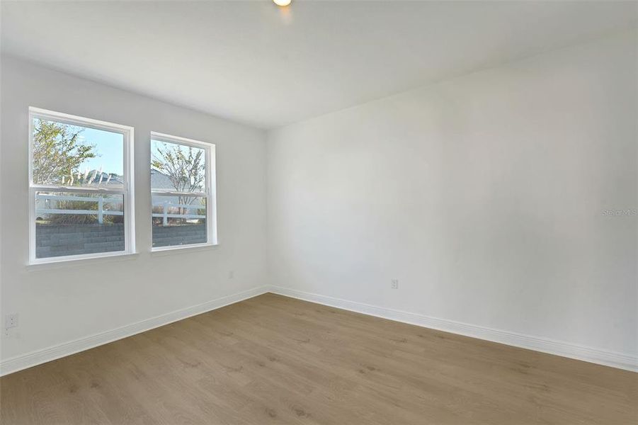 Spacious, unfurnished interior of a new home in Green Key Village, Lady Lake (Image 15).