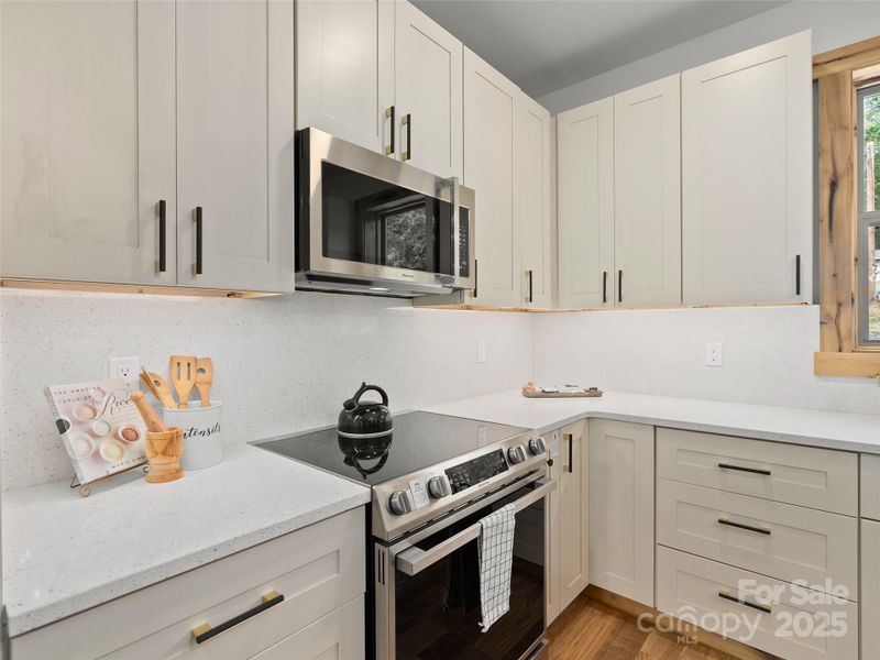 Furnished interior view inside a new home in , Waynesville (Image 6).