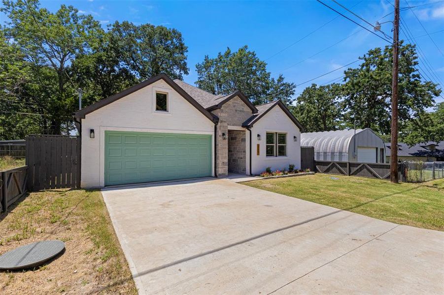 View of front of home featuring concrete driveway View of front of home featuring concrete driveway