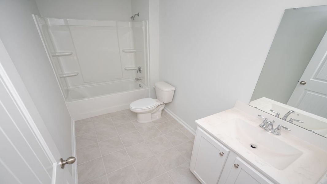 Furnished interior view inside a new home in Cedar Hill Landing, Navassa (Image 11).