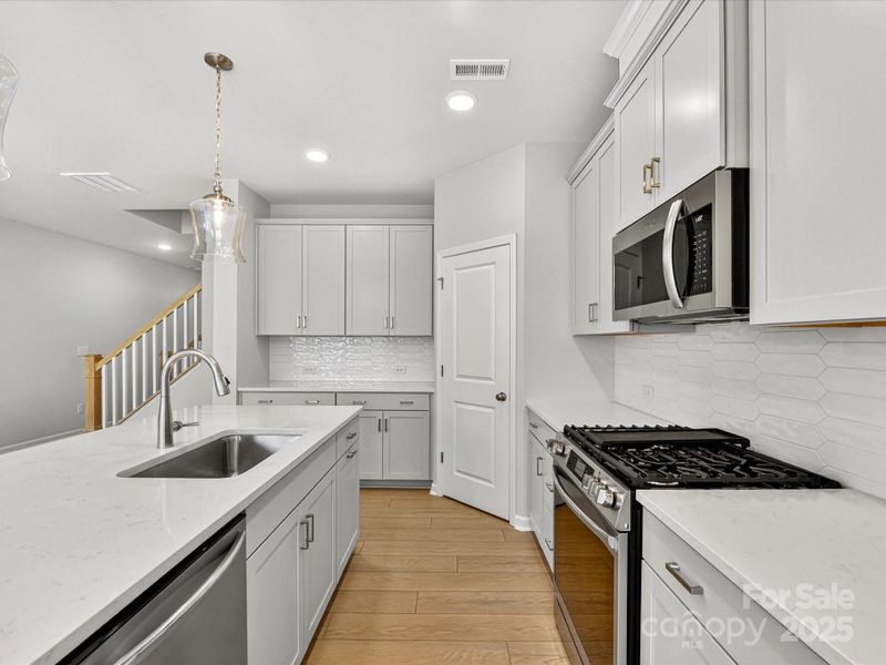 Furnished interior view inside a new home in North Creek Village - Townhomes, Huntersville (Image 8).