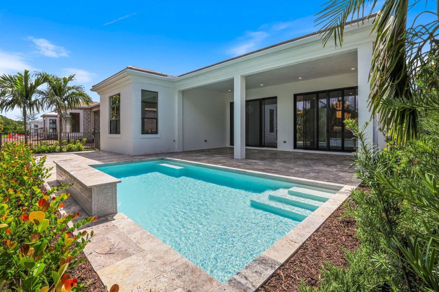 Exterior details and patio area of a home in Artistry Palm Beach, Palm Beach Gardens (Image 20).