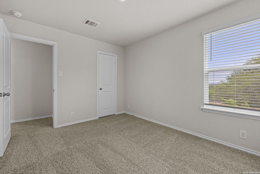 Spacious, unfurnished interior of a new home in Redbird Ranch, San Antonio (Image 10).
