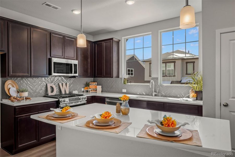 Furnished interior in a model home at Revel Crossing at Wolf Ranch – The Ascent Collection in Colorado Springs (Image 18).