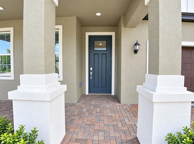 Exterior details and patio area of a home in Angeline Active Adult, Land O' Lakes (Image 4).