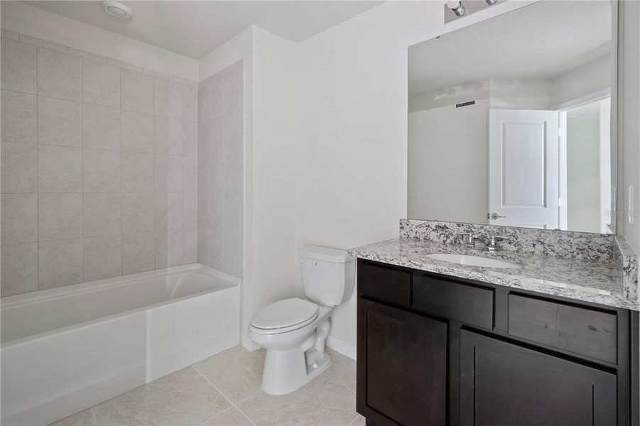 Furnished interior view inside a new home in , Kissimmee (Image 9). Furnished interior view inside a new home in , Kissimmee (Image 9).