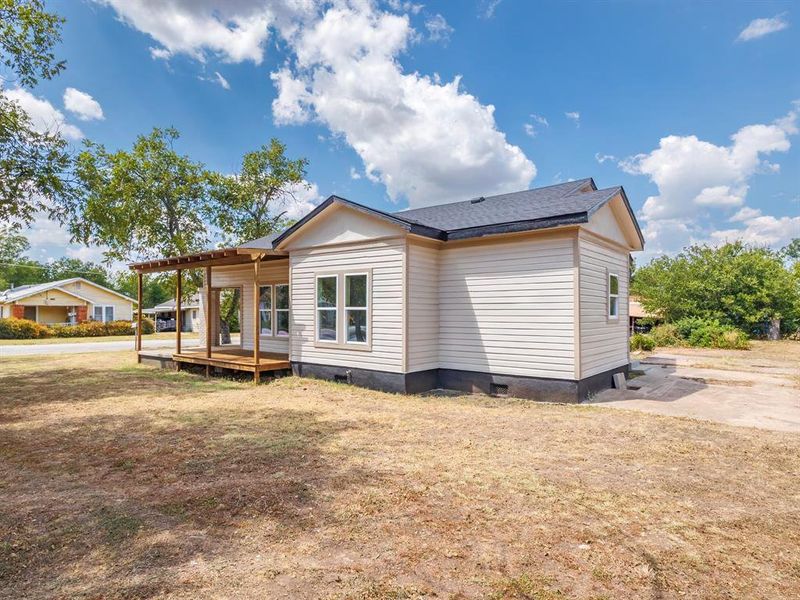 Front exterior of a new home in , Coleman, TX, highlighting curb appeal (Image 14). Front exterior of a new home in , Coleman, TX, highlighting curb appeal (Image 14).