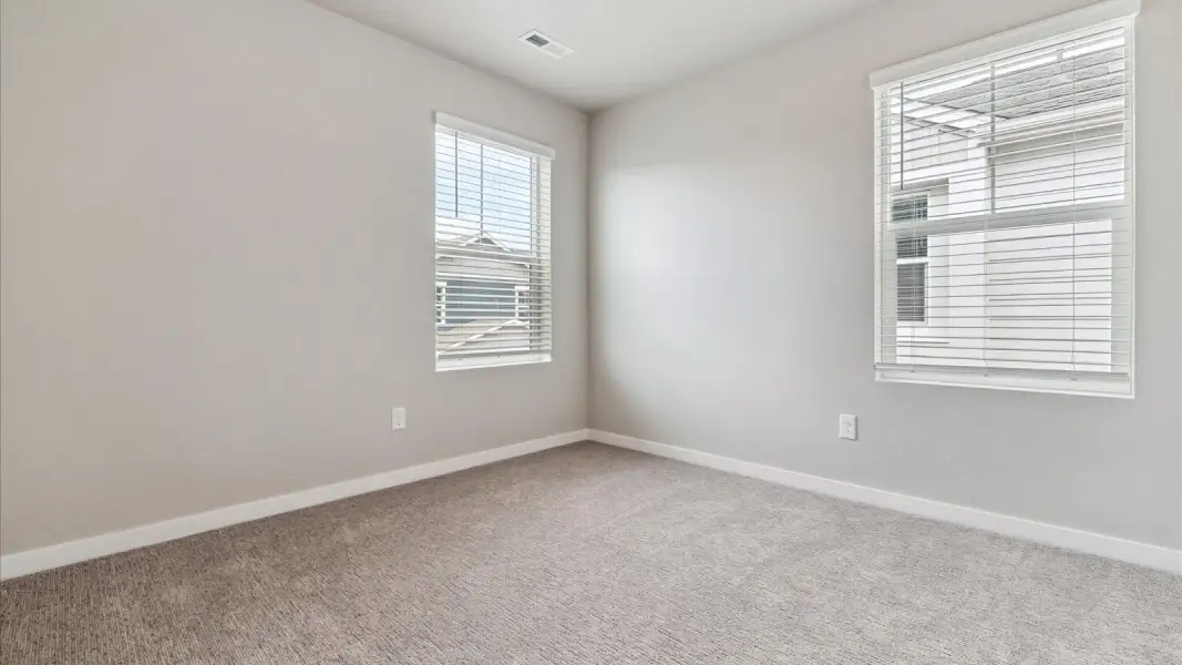 Spacious, unfurnished interior of a new home in Sky Ranch, Watkins (Image 17).