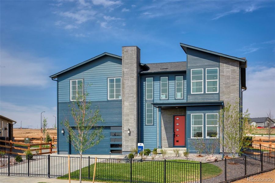 Front exterior of a new home in , Aurora, CO, highlighting curb appeal (Image 21).