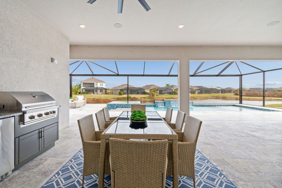 Exterior details and patio area of a home in River Preserve Estates, Parrish (Image 40).