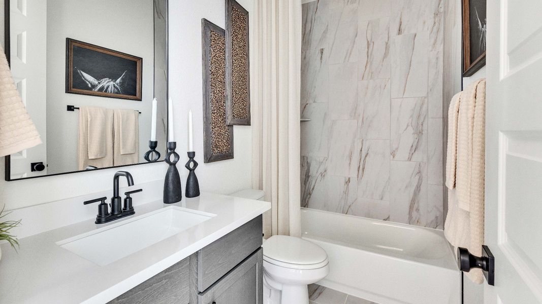 Representative furnished interior of a home built from the Palm by DRB Homes in Revelry, Del Valle (Image 14).