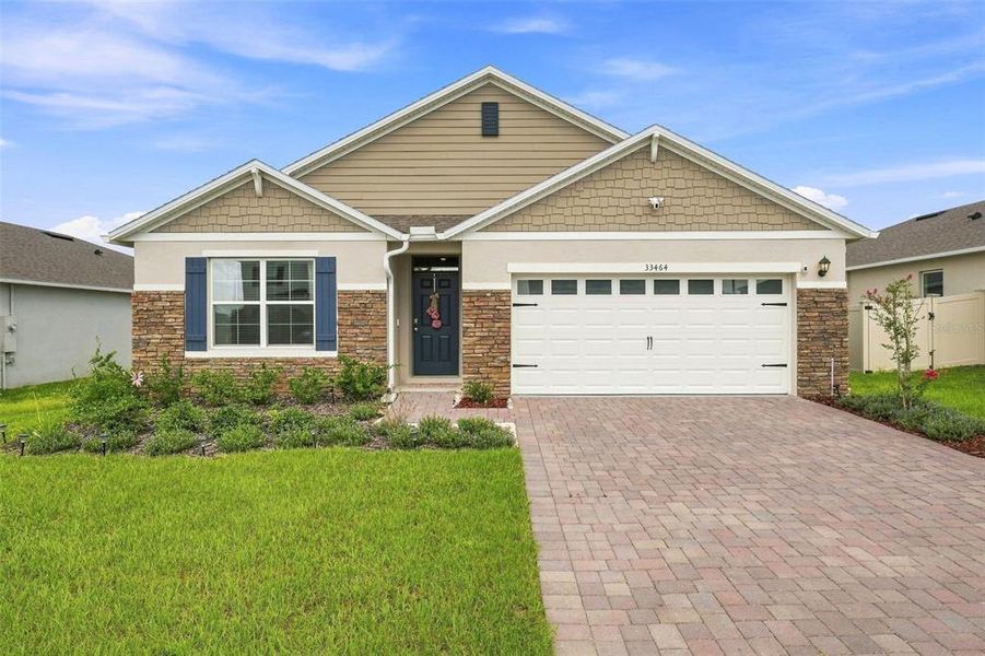 Front exterior of a new home in , Sorrento, FL, highlighting curb appeal (Image 24).
