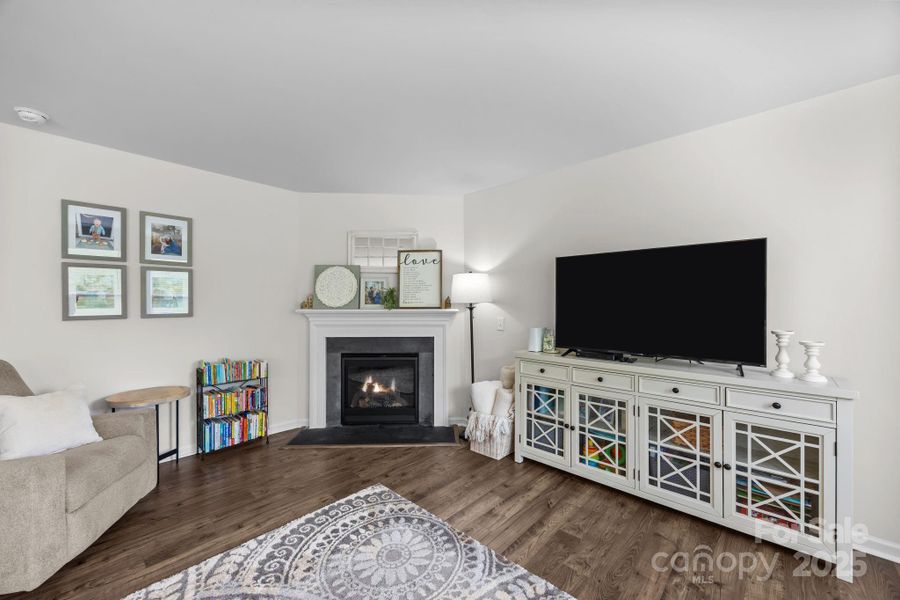 A cozy gas fireplace for those crisp Asheville evenings.