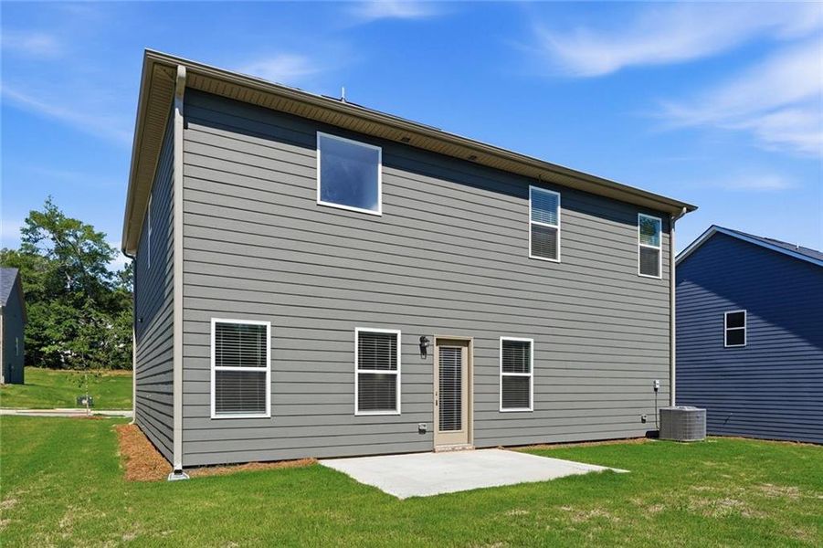 Exterior details and patio area of a home in River Walk Farm, Covington (Image 3).