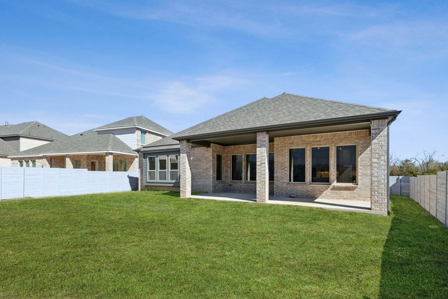 Exterior details and patio area of a home in Painted Tree Lakeside, McKinney (Image 4).